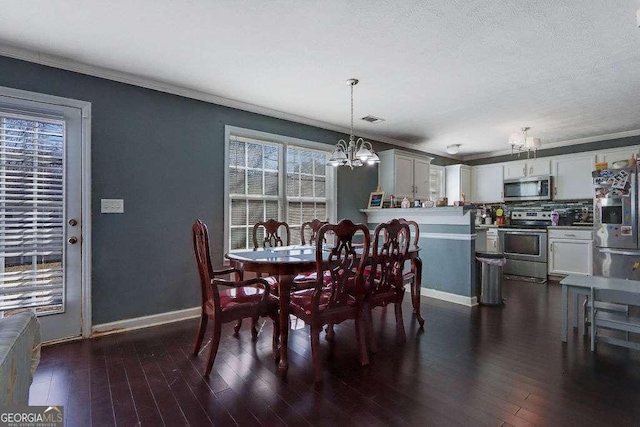 dining space with crown molding, baseboards, dark wood finished floors, and a notable chandelier