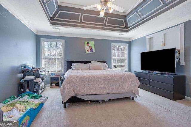 carpeted bedroom with visible vents, coffered ceiling, baseboards, ceiling fan, and ornamental molding