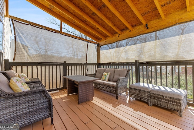 deck featuring an outdoor living space