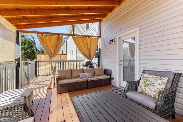 wooden deck featuring an outdoor hangout area