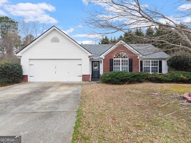 single story home featuring brick siding, driveway, an attached garage, and roof with shingles