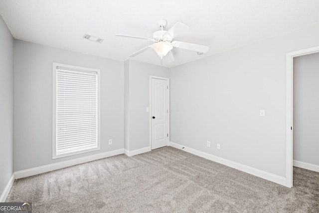 1409 Nantucket Dr, Bethlehem, GA 30620 - unfurnished bedroom featuring carpet and ceiling fan