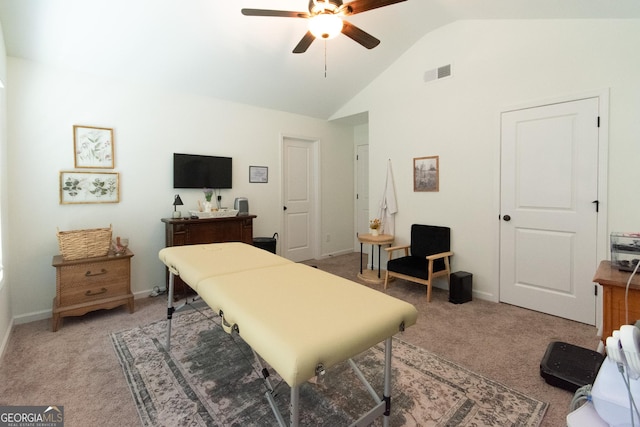 bedroom featuring vaulted ceiling, a ceiling fan, visible vents, and light colored carpet