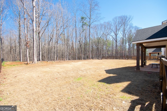 view of yard with fence