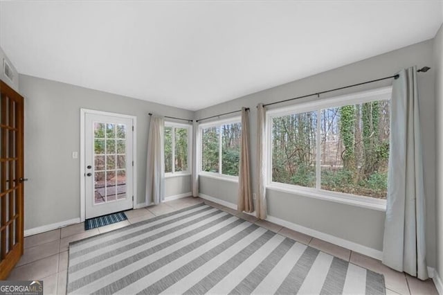 view of unfurnished sunroom