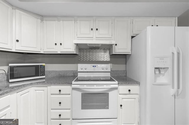 kitchen featuring under cabinet range hood, white cabinetry, and white appliances