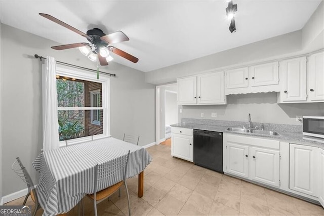 kitchen with a sink, baseboards, white cabinets, dishwasher, and stainless steel microwave