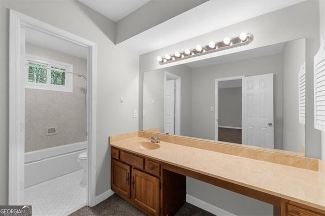 full bath featuring toilet, vanity, and shower / tub combination