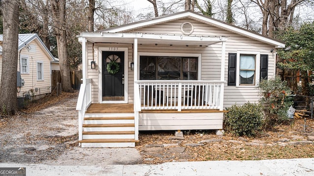 bungalow-style house featuring covered porch