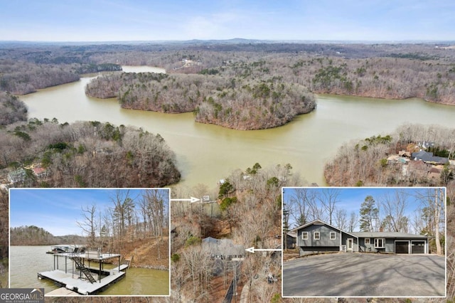 drone / aerial view with a forest view and a water view