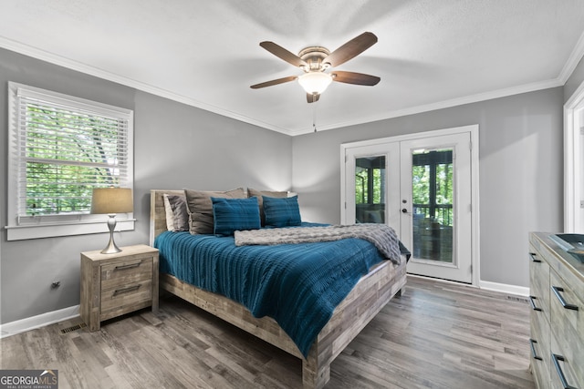 3928 Lake Ct, Gainesville, GA 30501 - bedroom featuring crown molding, wood finished floors, access to exterior, baseboards, and french doors