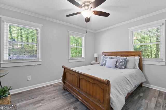 3928 Lake Ct, Gainesville, GA 30501 - bedroom with baseboards, multiple windows, wood finished floors, and ornamental molding