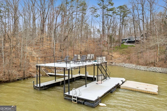 view of dock with a water view