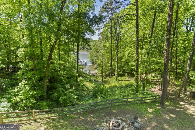 3928 Lake Ct, Gainesville, GA 30501 - view of yard with fence and an outdoor fire pit