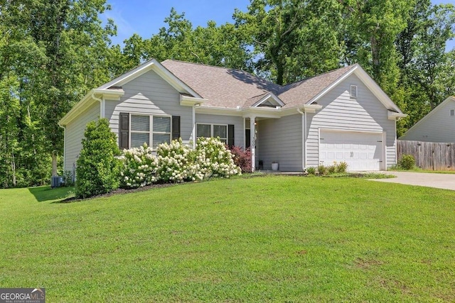 ranch-style home featuring central air condition unit, concrete driveway, fence, a garage, and a front lawn