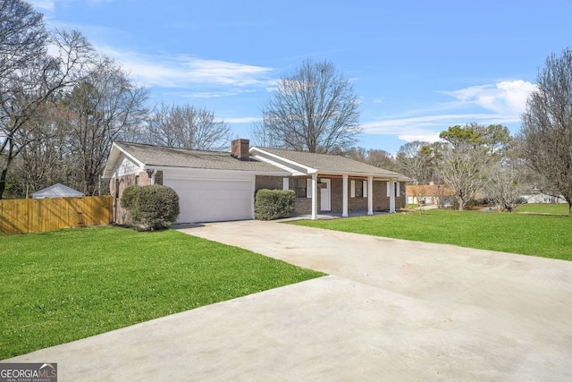 ranch-style home featuring driveway, an attached garage, fence, a front lawn, and brick siding