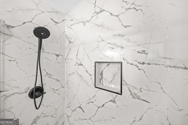 details with a marble finish shower