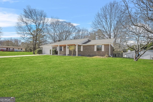 single story home with crawl space, a front yard, a garage, and brick siding