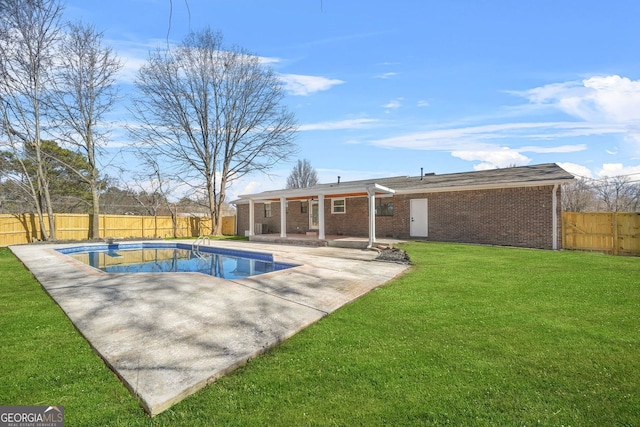 view of pool featuring a fenced in pool, a patio area, a fenced backyard, and a yard