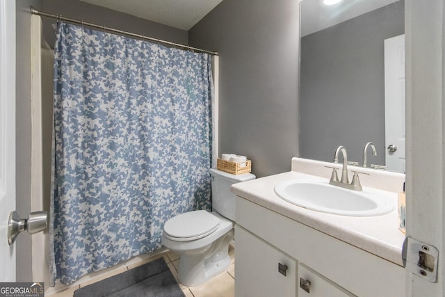 bathroom with toilet, tile patterned flooring, a shower with shower curtain, and vanity