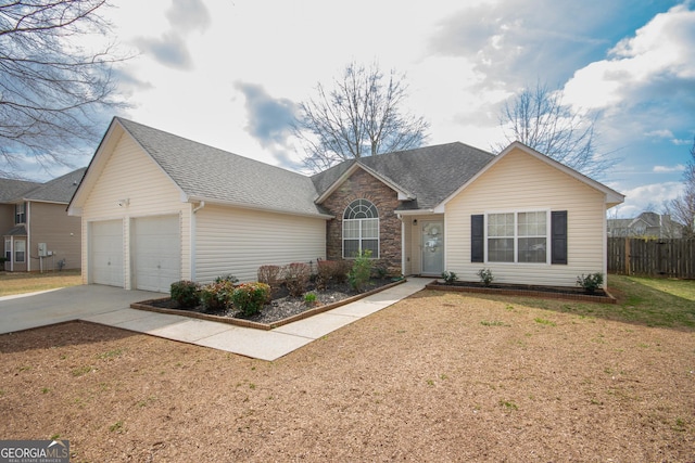 single story home featuring a shingled roof, stone siding, an attached garage, fence, and a front lawn