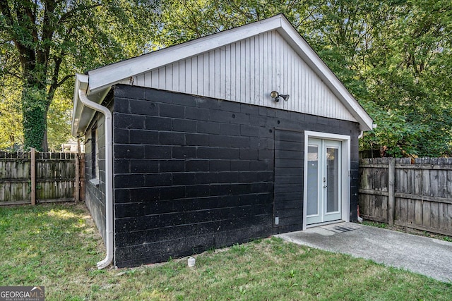 view of outbuilding featuring an outdoor structure and a fenced backyard