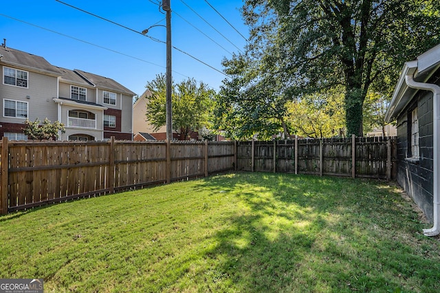 view of yard featuring a fenced backyard