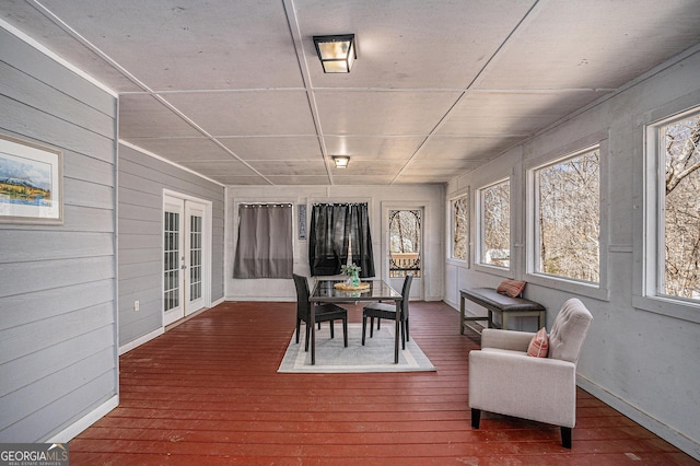 sunroom featuring french doors