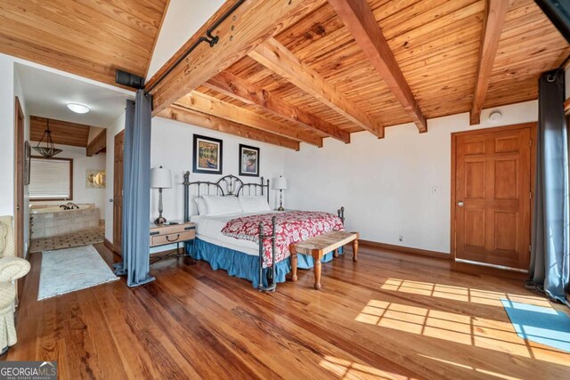 bedroom with wooden ceiling, beamed ceiling, baseboards, and wood finished floors