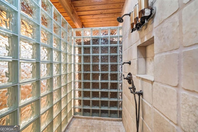 full bathroom featuring wood ceiling and a walk in shower