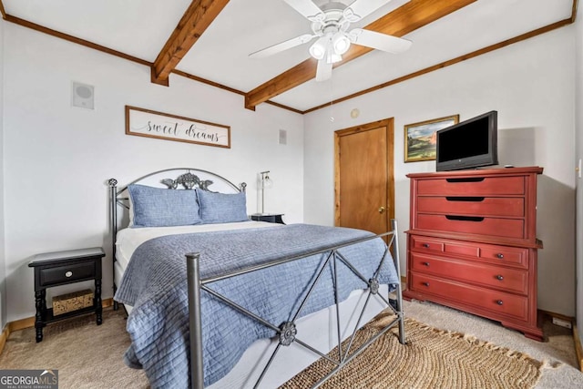 bedroom with baseboards, ornamental molding, beam ceiling, and light colored carpet