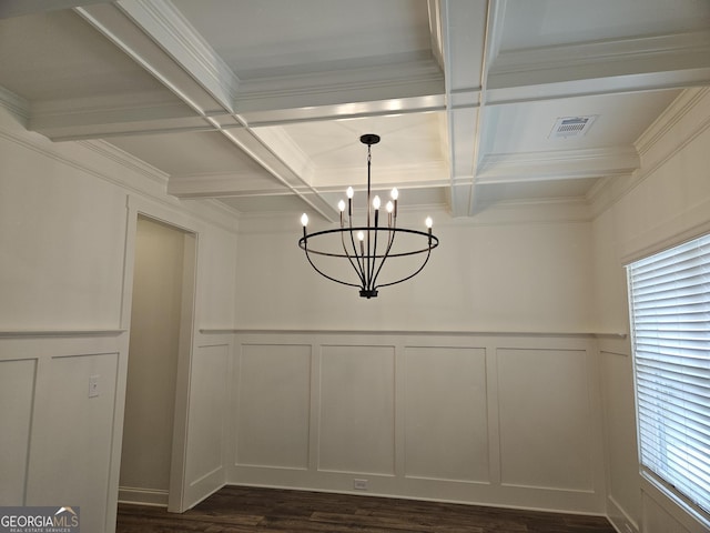 details featuring beam ceiling, a notable chandelier, coffered ceiling, visible vents, and a decorative wall