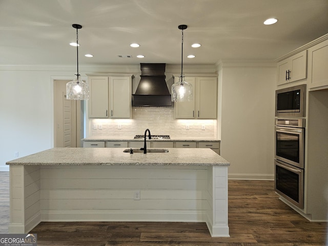 kitchen featuring crown molding, built in microwave, custom range hood, and double oven