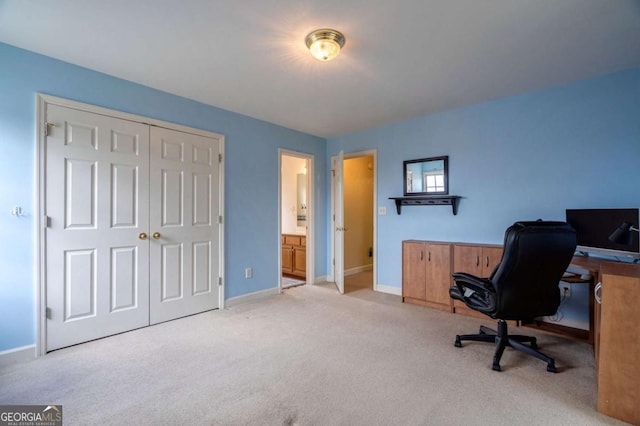 office area with carpet flooring and baseboards