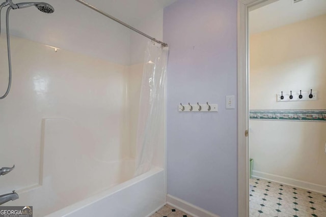 full bathroom with shower / bathtub combination with curtain, baseboards, and tile patterned floors