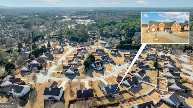 drone / aerial view featuring a residential view