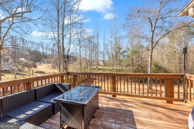 deck featuring outdoor lounge area