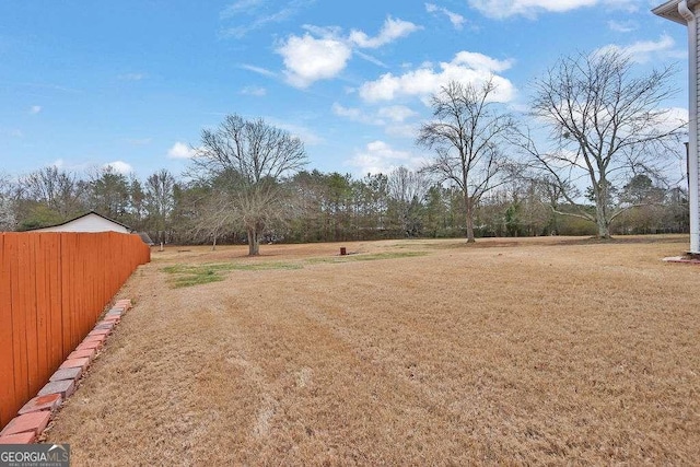 view of yard featuring fence