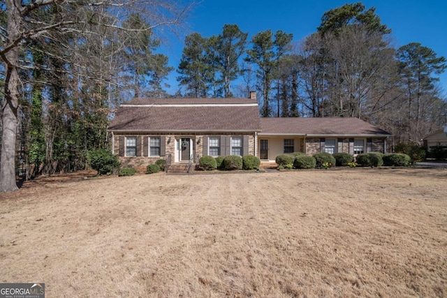 view of front of home with a chimney