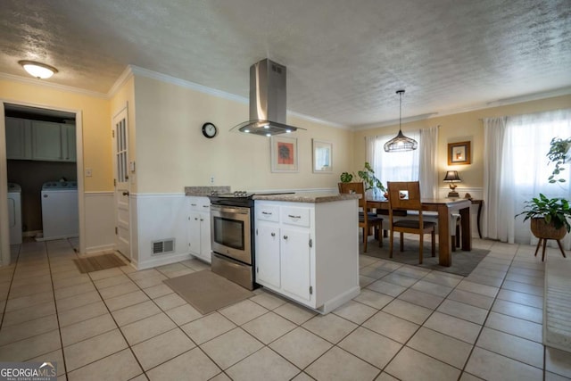 kitchen featuring stainless steel gas stove, light tile patterned floors, visible vents, ventilation hood, and white cabinetry