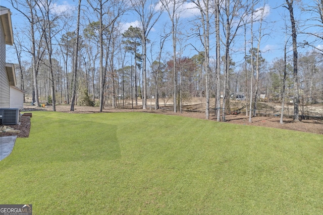 view of yard with central AC