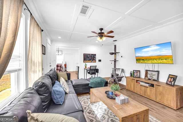 living area with light wood finished floors, a ceiling fan, visible vents, and recessed lighting