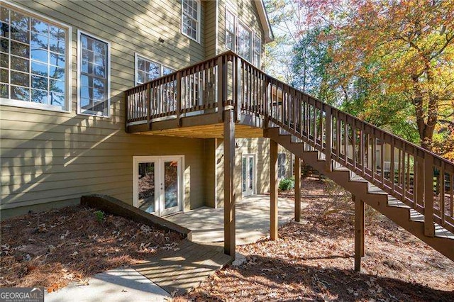 exterior space featuring french doors, a patio area, and stairs