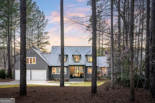 exterior space featuring driveway and an attached garage