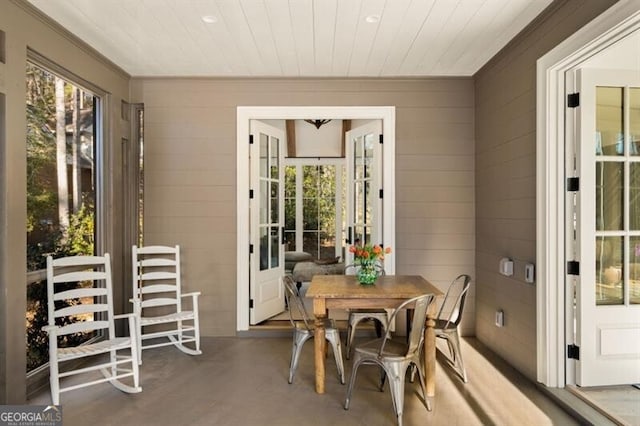 sunroom featuring wood ceiling