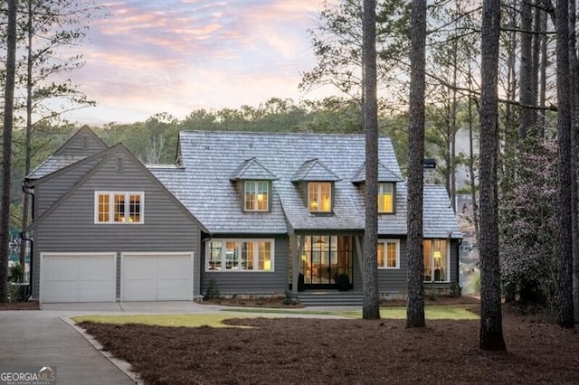 view of front facade featuring driveway and a garage