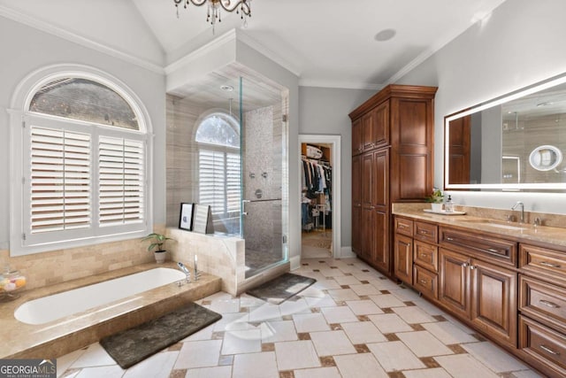 full bath with a garden tub, a stall shower, crown molding, vanity, and vaulted ceiling