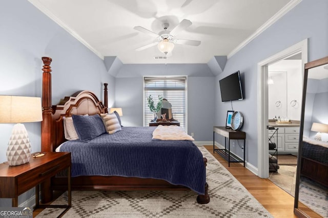 bedroom with a ceiling fan, visible vents, baseboards, light wood-style flooring, and ornamental molding