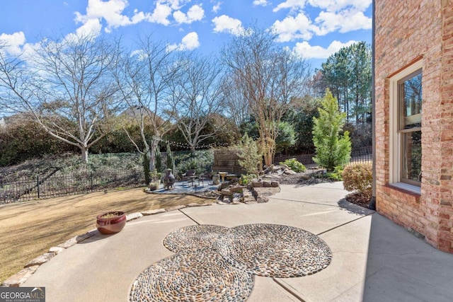 view of patio / terrace with fence