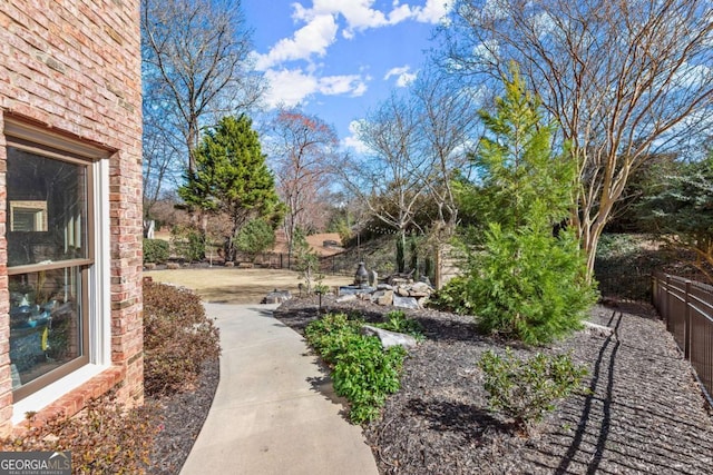 view of yard with fence